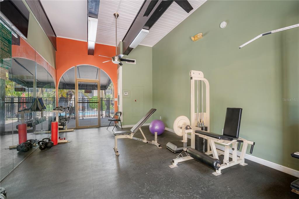 5305 San Sebastian Court, Unit 125 Tampa, FL 33609 - Photo 20 of 21 a view of a room with gym equipment
