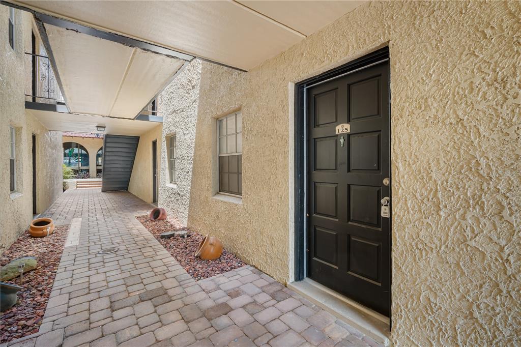 5305 San Sebastian Court, Unit 125 Tampa, FL 33609 - Photo 2 of 21 a view of a entryway door of the house