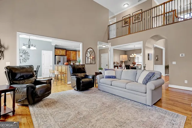 a spacious bathroom with a sink and a mirror