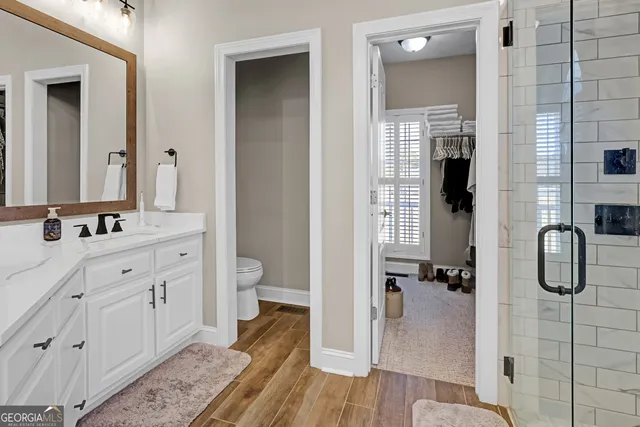 a bathroom with a tub and a shower