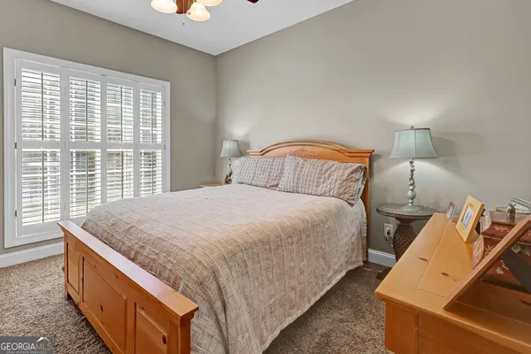a view of a room with wooden walls