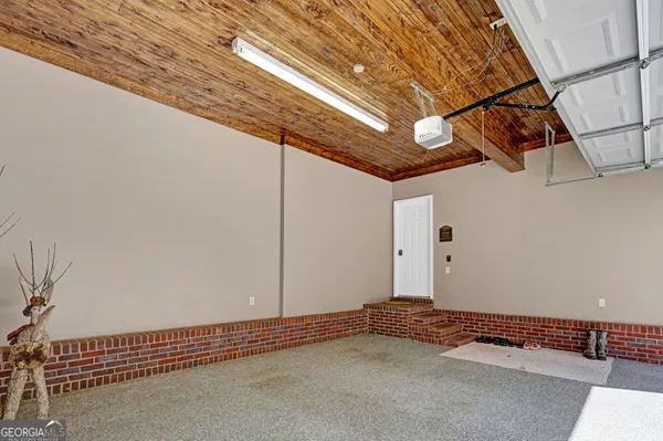 a view of a swimming pool with a lawn chairs