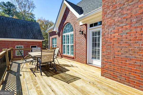 a view of a swimming pool with lounge chair