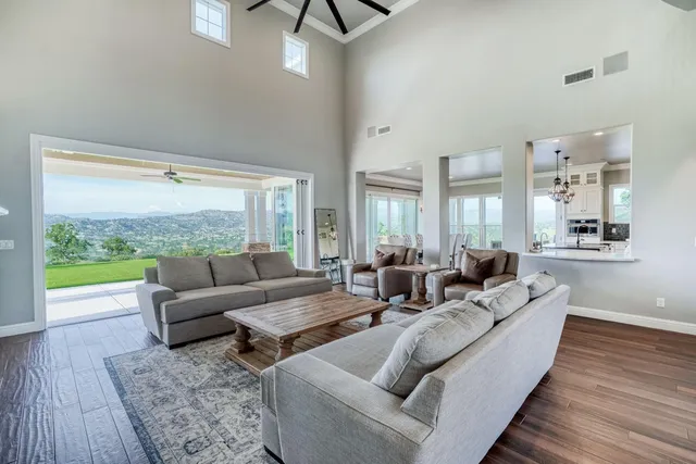 a kitchen with wooden cabinets and a stove top oven