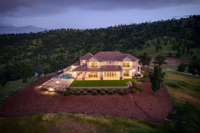 a view of a street with a garden