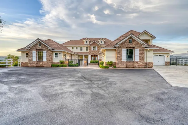 an aerial view of a house with a garden