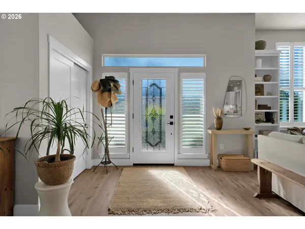 a view of livingroom with furniture and a potted plant