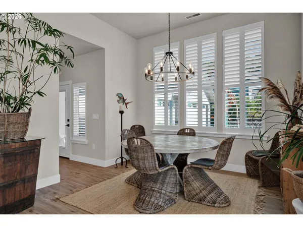 a view of a dining room with furniture window and outside view