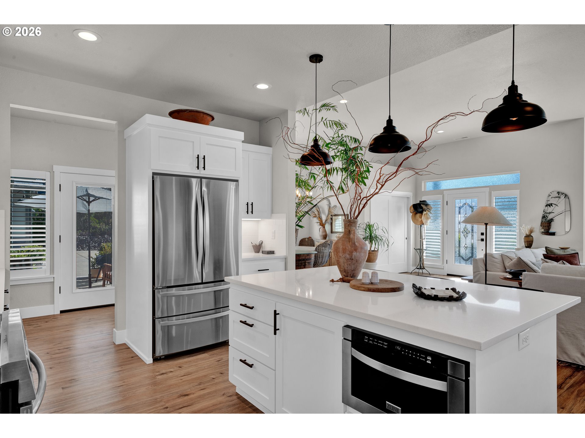 34 Bonnett Way Florence, OR 97439 - Photo 21 of 48 a kitchen with stainless steel appliances granite countertop a refrigerator a sink and a stove