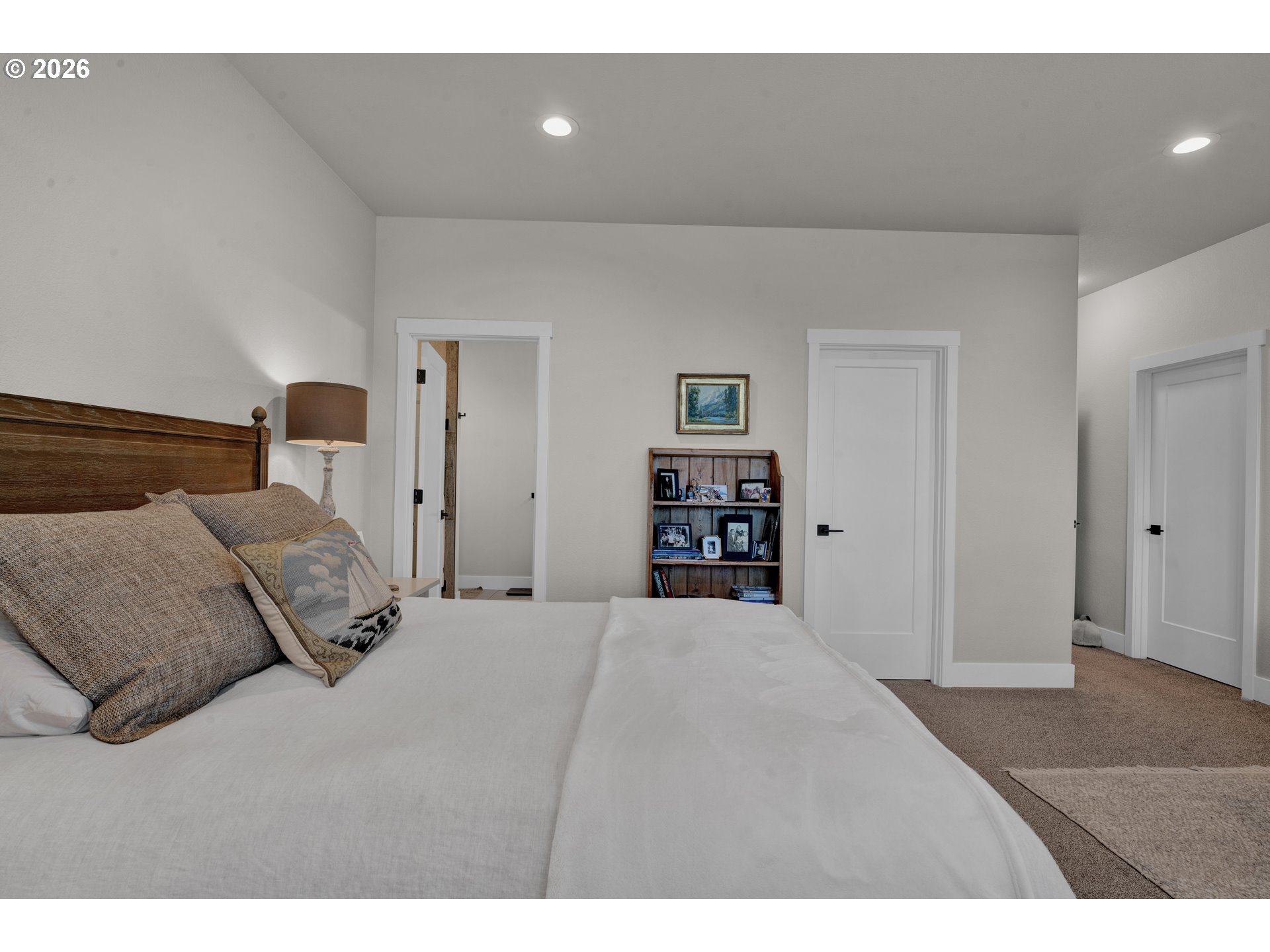 34 Bonnett Way Florence, OR 97439 - Photo 29 of 48 a bedroom with a bed and a couch