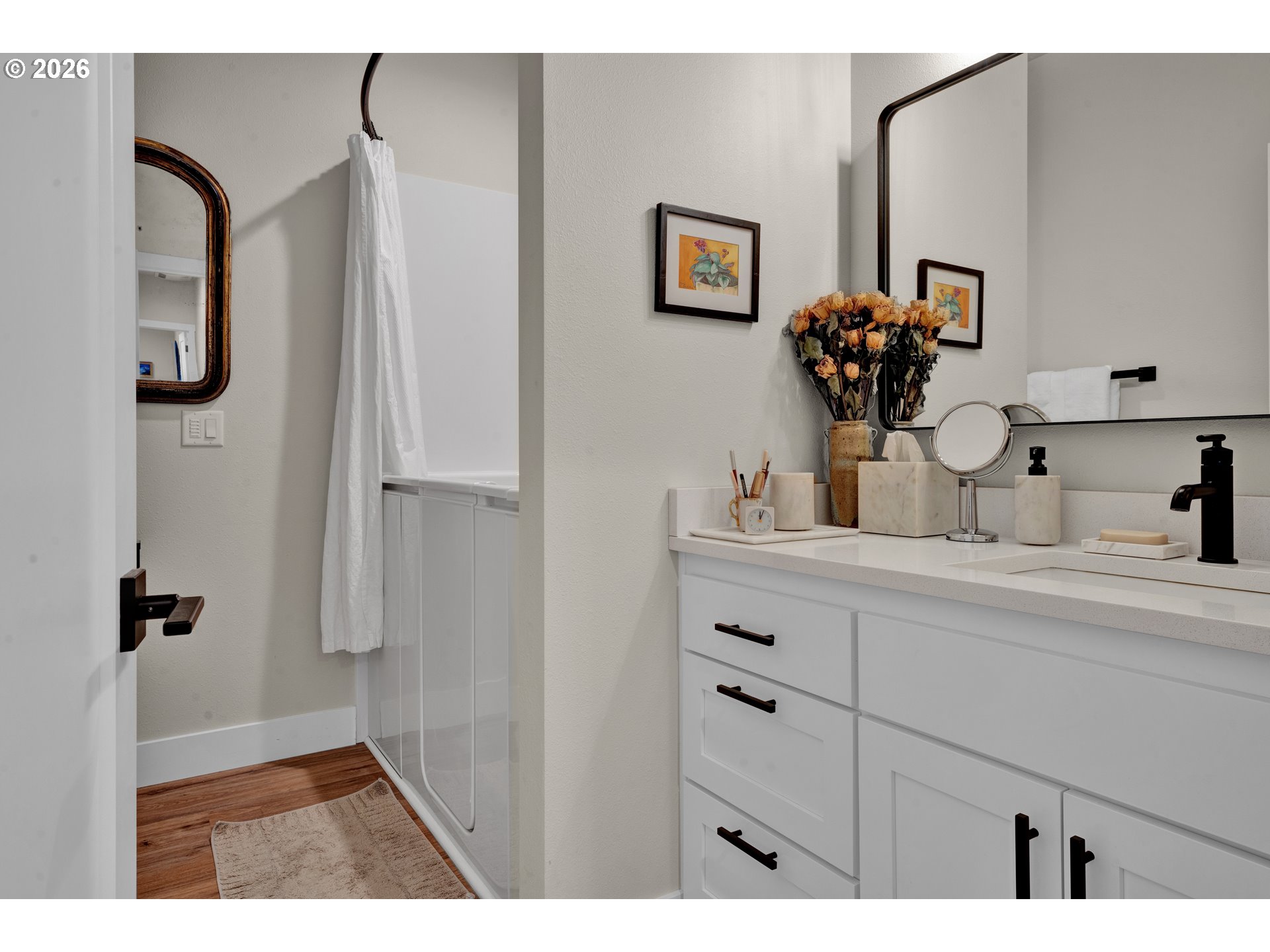 34 Bonnett Way Florence, OR 97439 - Photo 36 of 48 a bathroom with a sink and a mirror