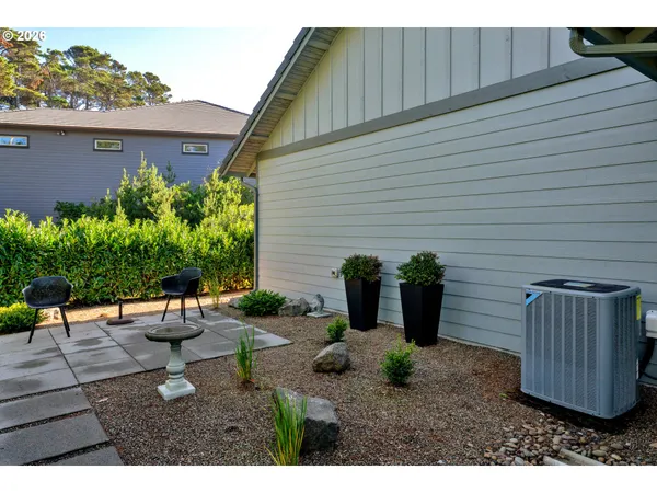 a backyard of a house with seating space