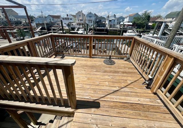 87 Bartlett Place Brooklyn, NY 11229 - Photo 2 of 20 a view of balcony with wooden floor