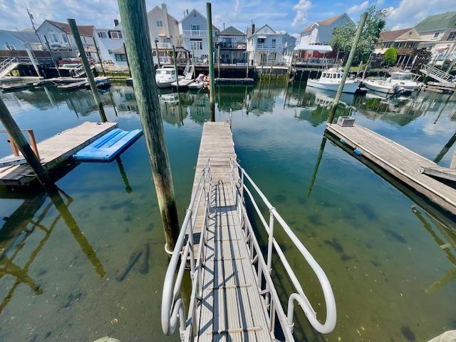 87 Bartlett Place Brooklyn, NY 11229 - Photo 4 of 20 a view of a lake with two chairs