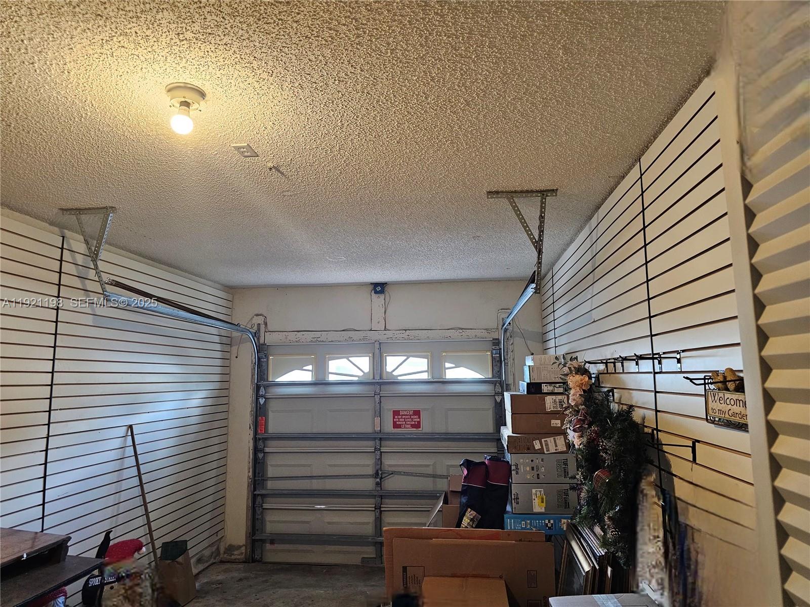 10816 Southwest 75th Street Miami, FL 33173 - Photo 17 of 20 a view of a room with gym equipment