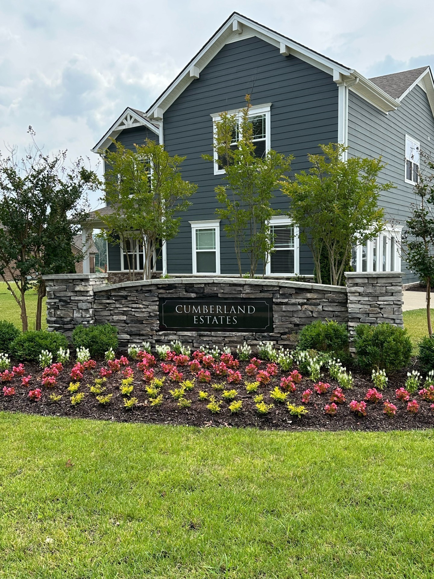 9008 Ada Way Fairview, TN 37062 - Photo 14 of 14 a front view of a house with a yard and outdoor seating