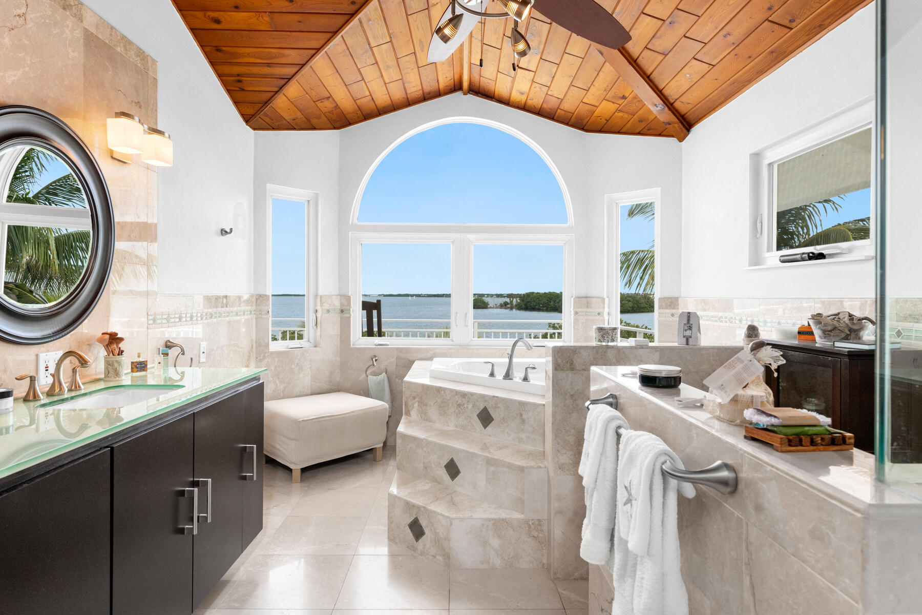 51 Mutiny Place Key Largo, FL 33037 - Photo 32 of 75 a living room with furniture and a fireplace