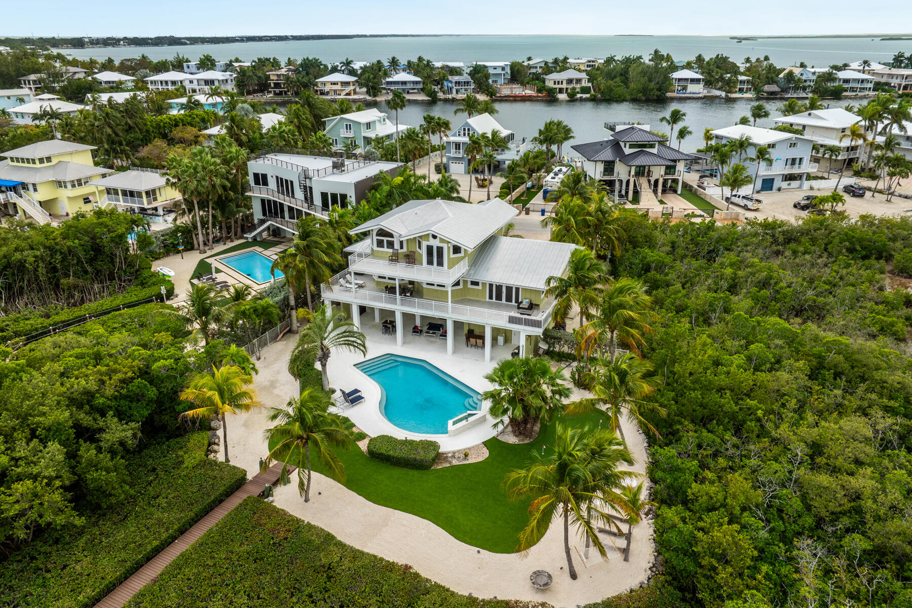 51 Mutiny Place Key Largo, FL 33037 - Photo 70 of 75 an aerial view of residential houses with outdoor space