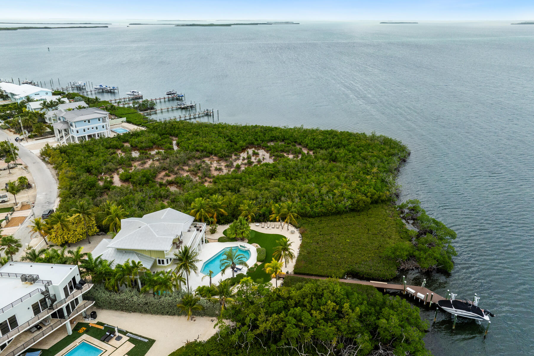 51 Mutiny Place Key Largo, FL 33037 - Photo 73 of 75 an aerial view of a house with a yard