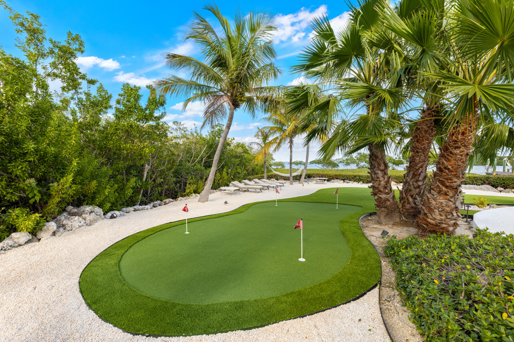51 Mutiny Place Key Largo, FL 33037 - Photo 9 of 75 a view of a swimming pool with a yard