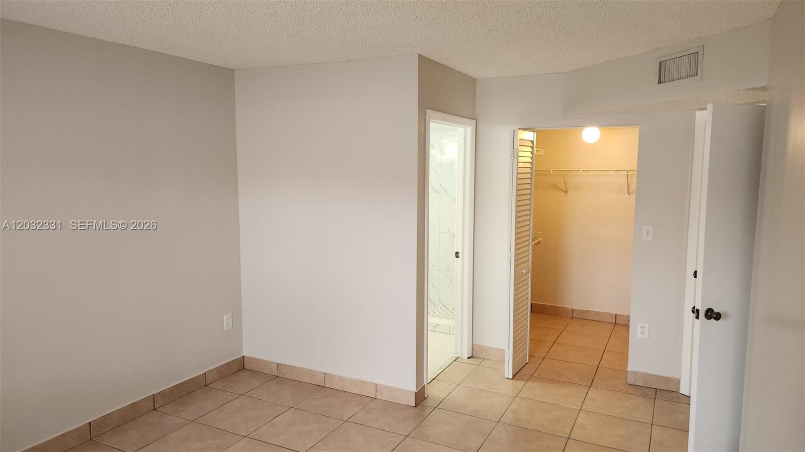 6416 Southwest 131st Path, Unit 1705 Miami, FL 33183 - Photo 9 of 29 Master Bedroom-walk-in closet + bath entry