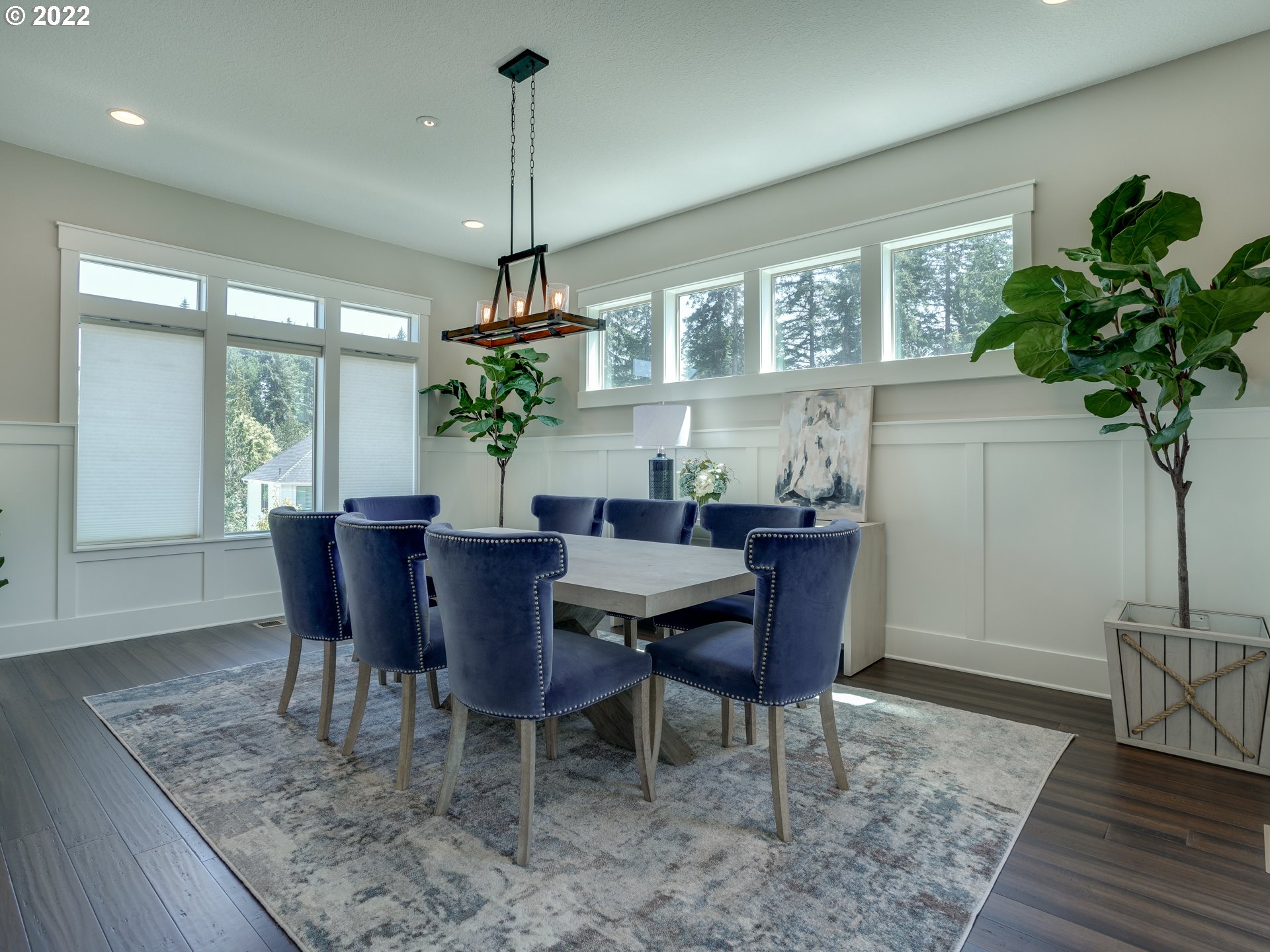 701 South 19th Place Ridgefield, WA 98642 - Photo 11 of 32 a view of a dining room with furniture window and wooden floor
