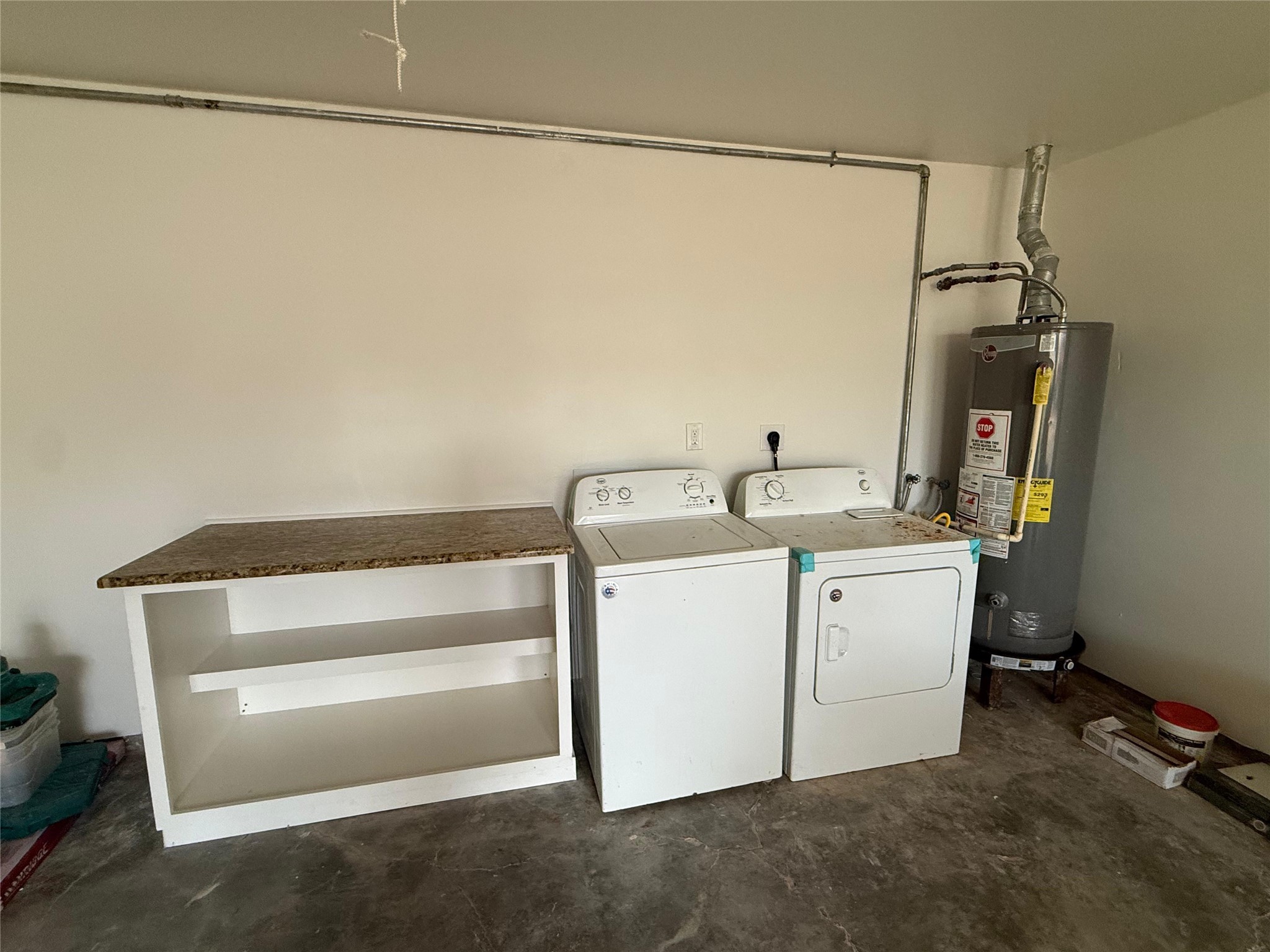 6210 Delany Road Hitchcock, TX 77563 - Photo 12 of 12 a utility room with dryer and washer