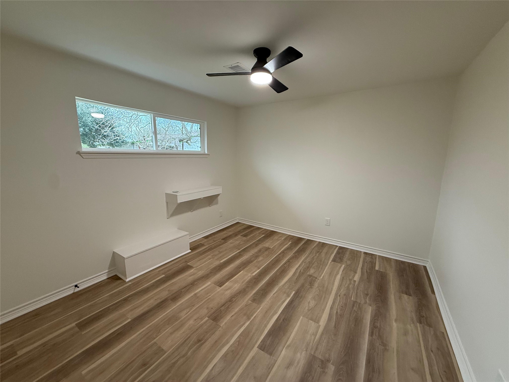 6210 Delany Road Hitchcock, TX 77563 - Photo 10 of 12 wooden floor in an empty room