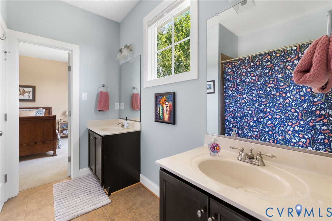 15936 Alsdell Road Midlothian, VA 23112 - Photo 26 of 45 Dual vanity with integrated sinks, dark wood-finis