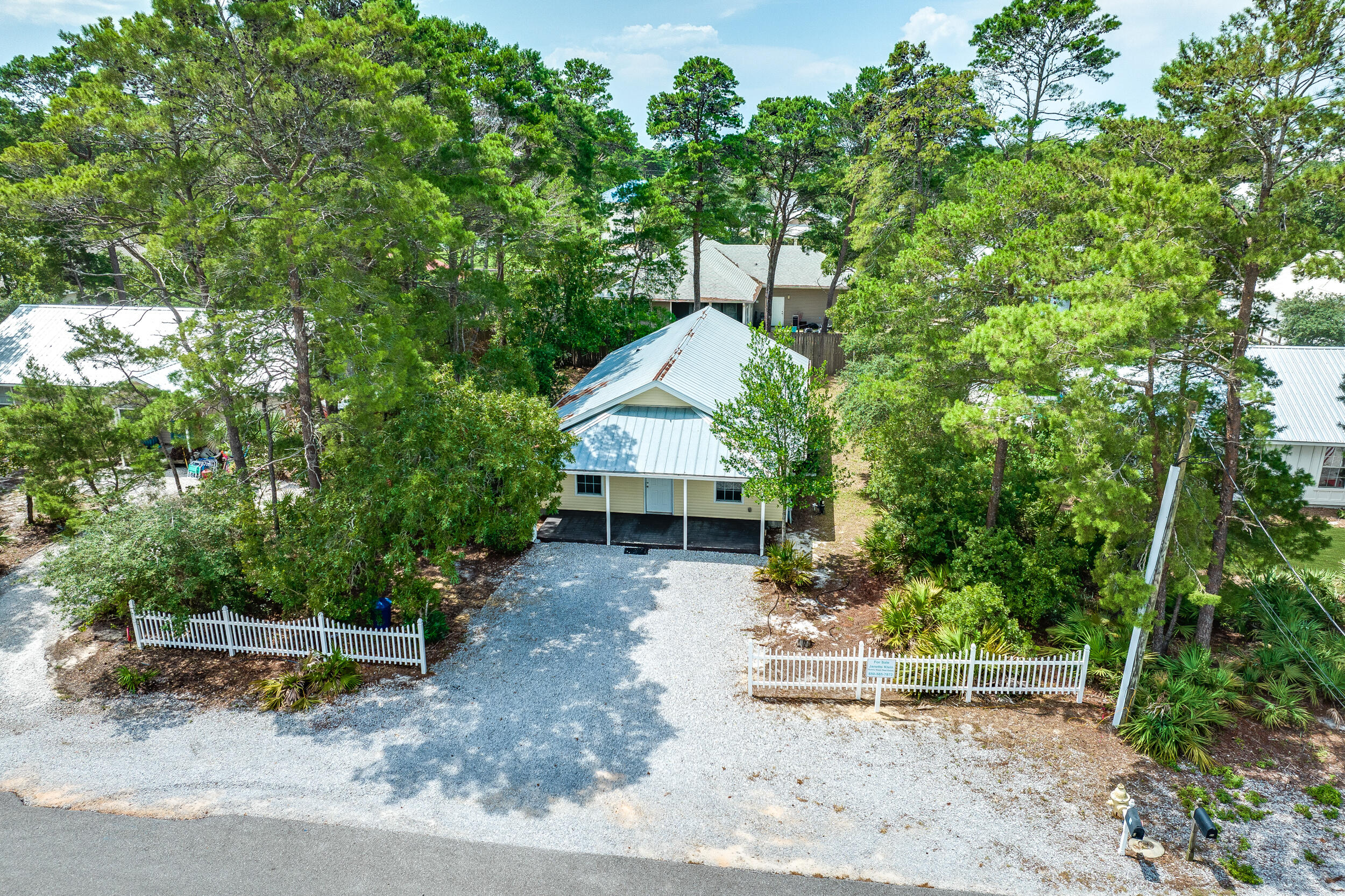 78 Walnut Street Santa Rosa Beach, FL 32459 - Photo 1 of 34 an aerial view of a house with a yard
