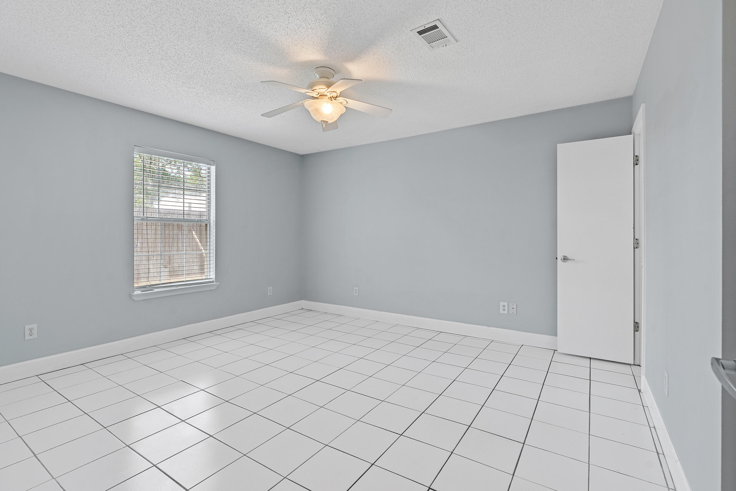 78 Walnut Street Santa Rosa Beach, FL 32459 - Photo 12 of 34 a view of an empty room and window
