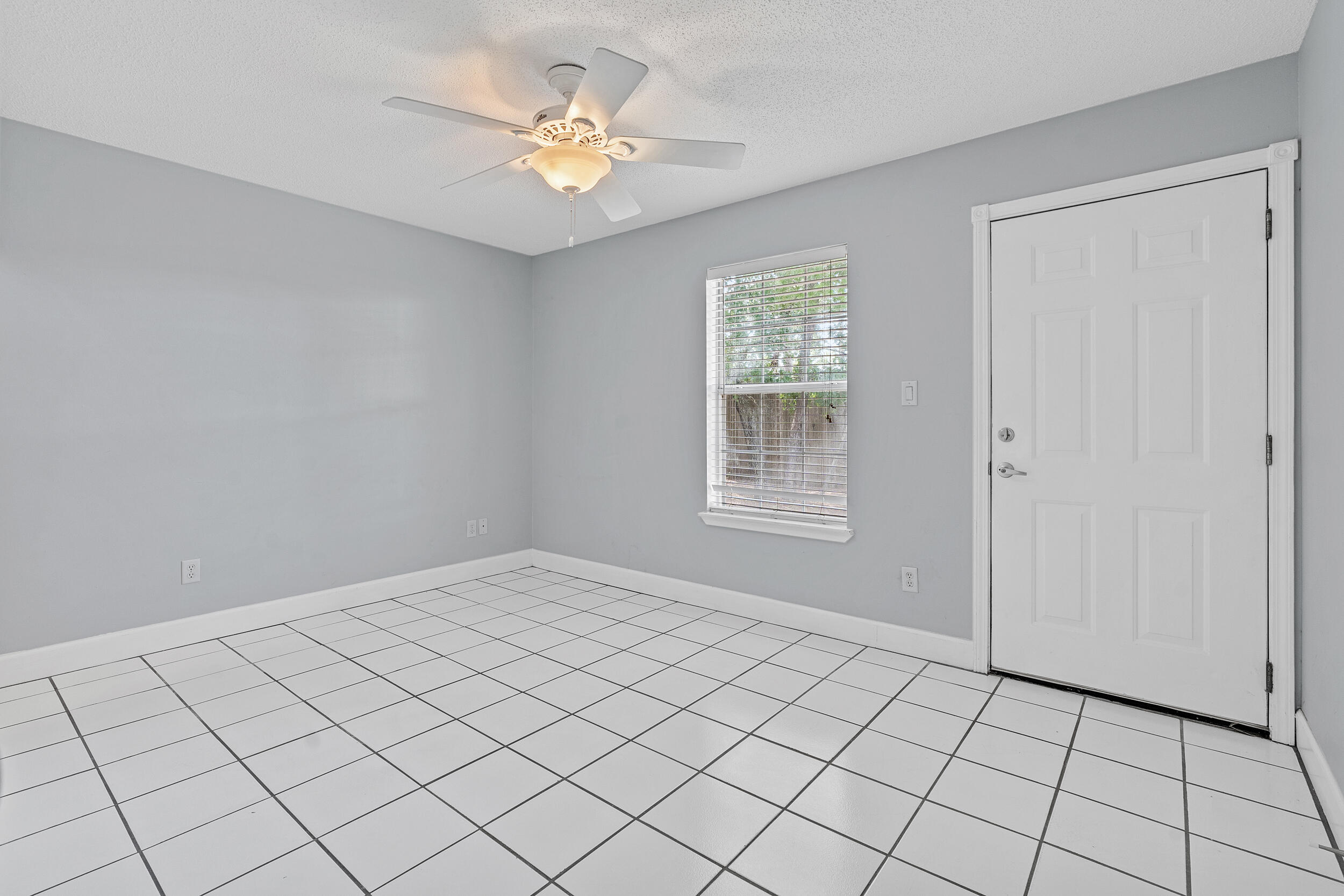 78 Walnut Street Santa Rosa Beach, FL 32459 - Photo 18 of 34 a view of an empty room with a window