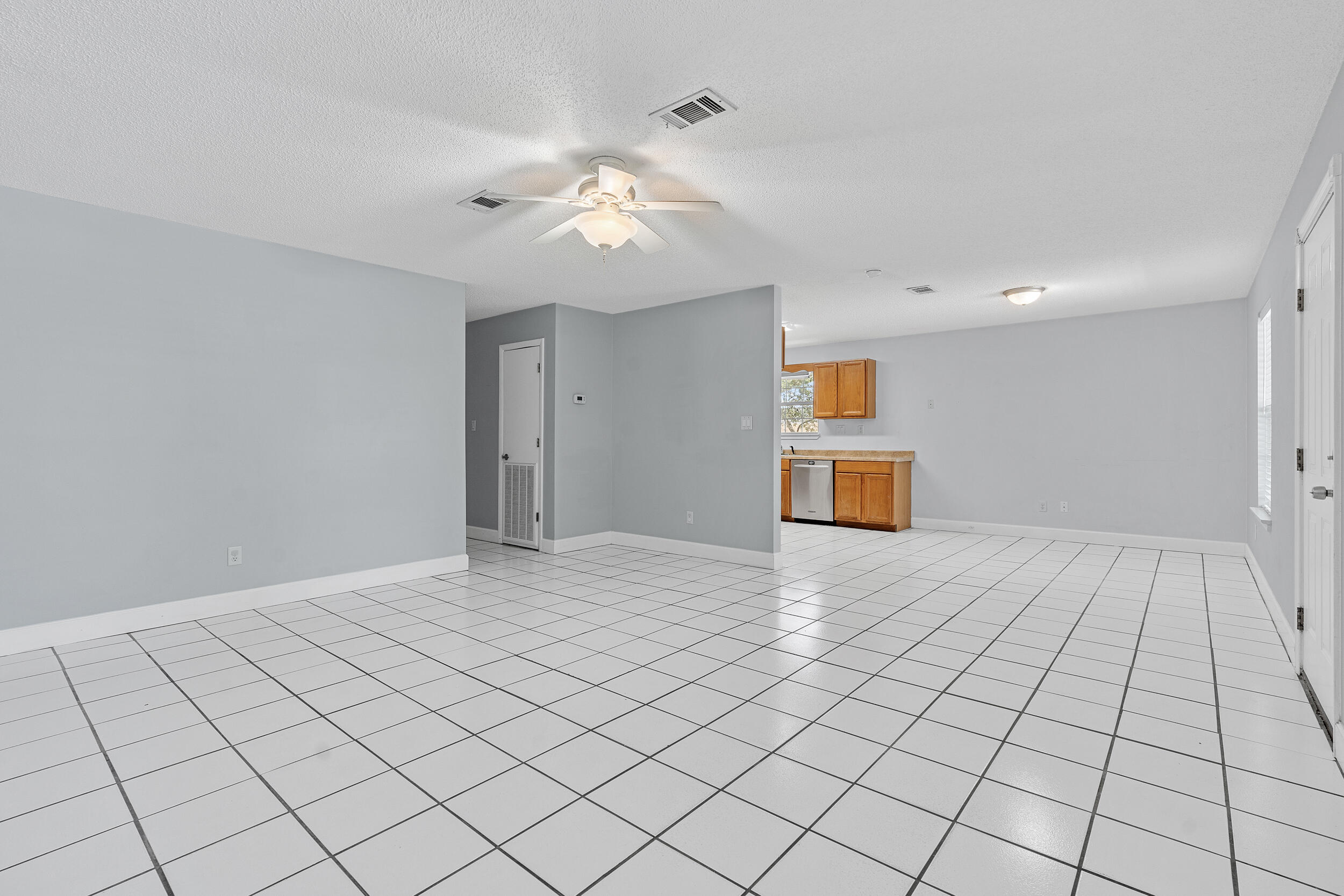 78 Walnut Street Santa Rosa Beach, FL 32459 - Photo 3 of 34 a view of an empty room and window
