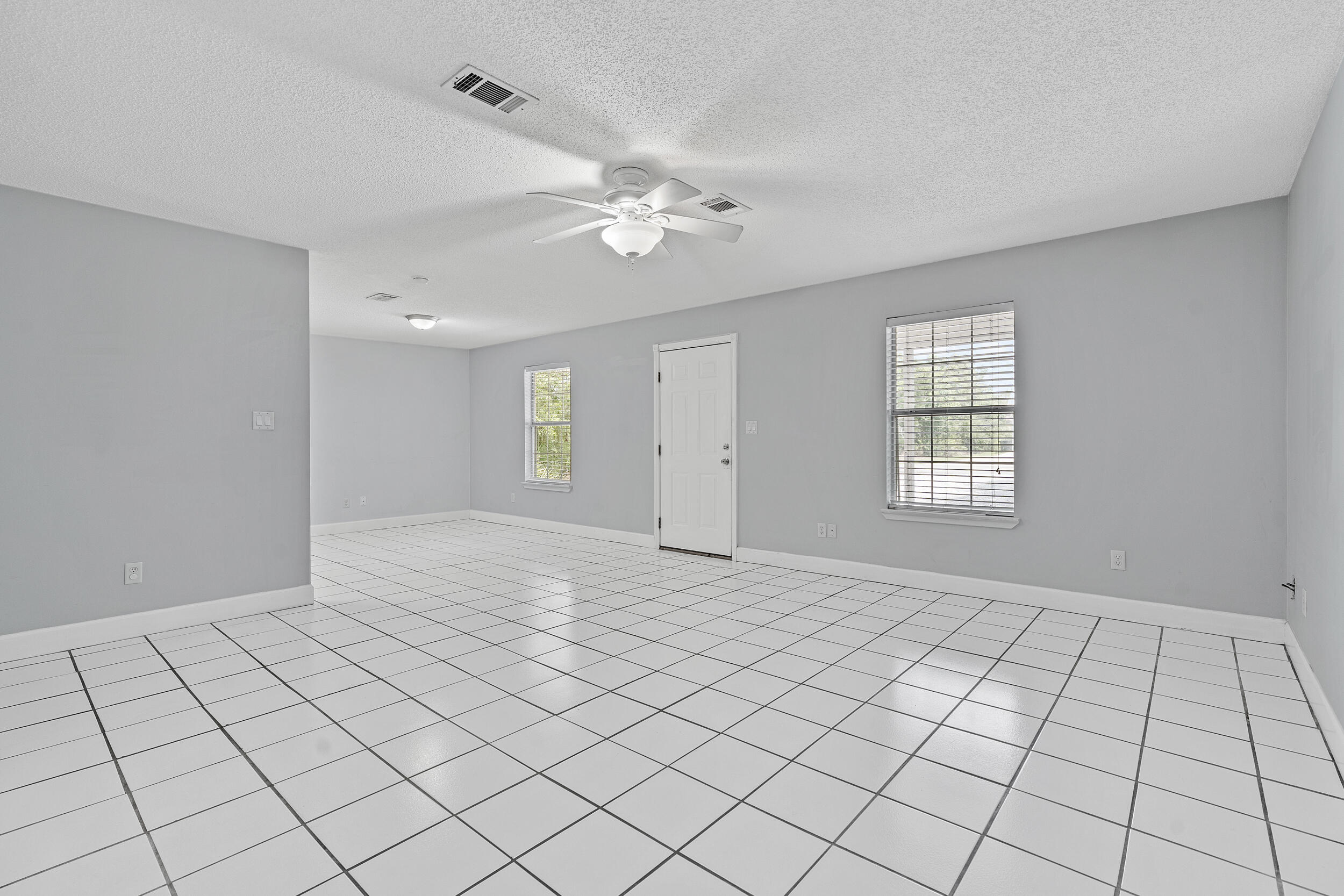 78 Walnut Street Santa Rosa Beach, FL 32459 - Photo 4 of 34 a view of an empty room and window