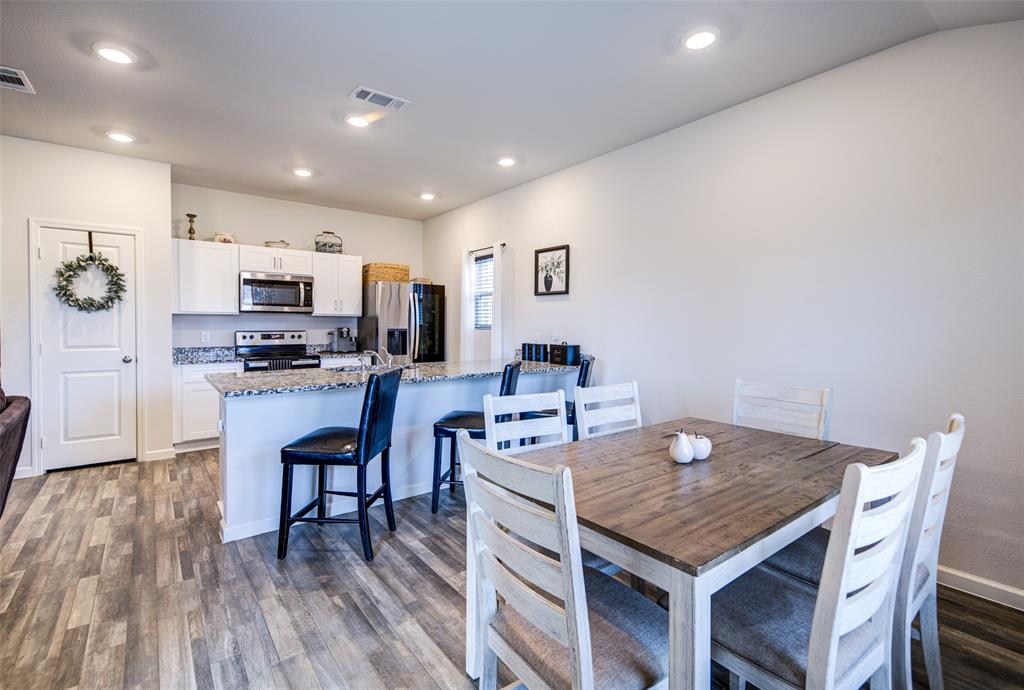 905 Avagail Avenue Springtown, TX 76082 - Photo 13 of 26 Dining space featuring dark wood finished floors and recessed lighting