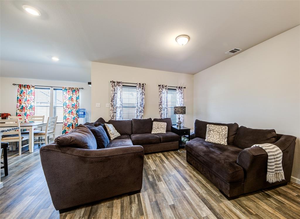 905 Avagail Avenue Springtown, TX 76082 - Photo 16 of 26 Living room featuring wood finished floors and recessed lighting