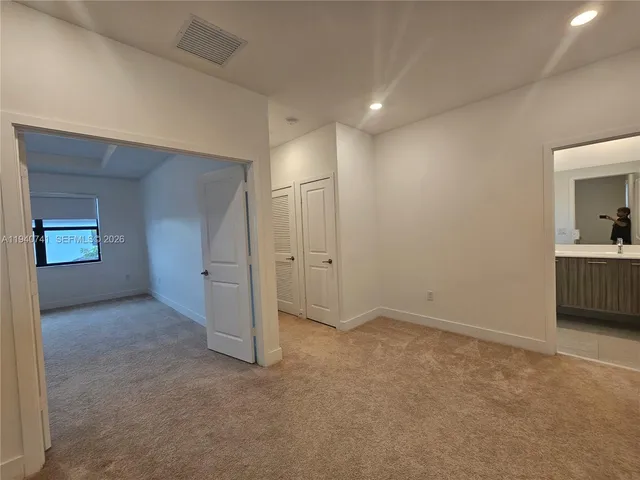 an empty room with a natural light