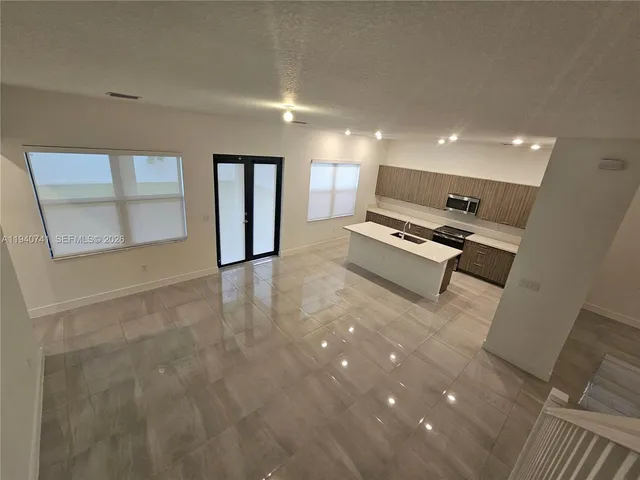 a living room with furniture and a table