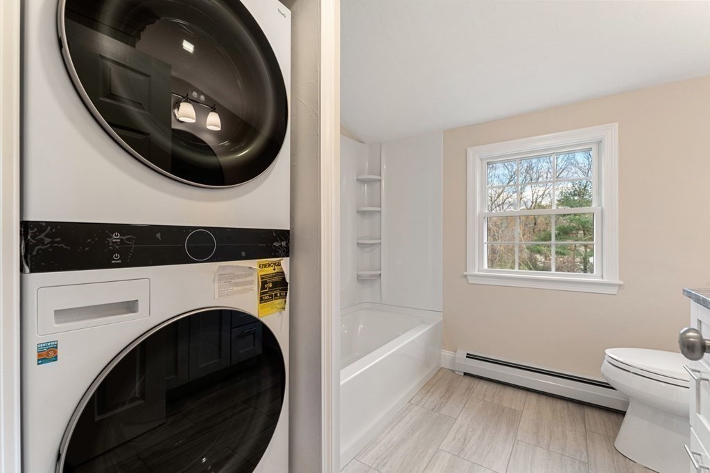1069 Main Street Dunstable, MA 01827 - Photo 29 of 41 a bathroom with a toilet and a sink