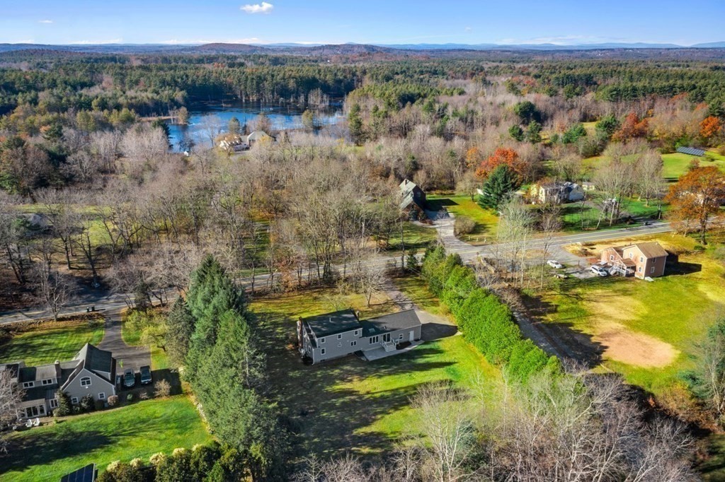 1069 Main Street Dunstable, MA 01827 - Photo 38 of 41 an aerial view of residential houses with outdoor space and trees