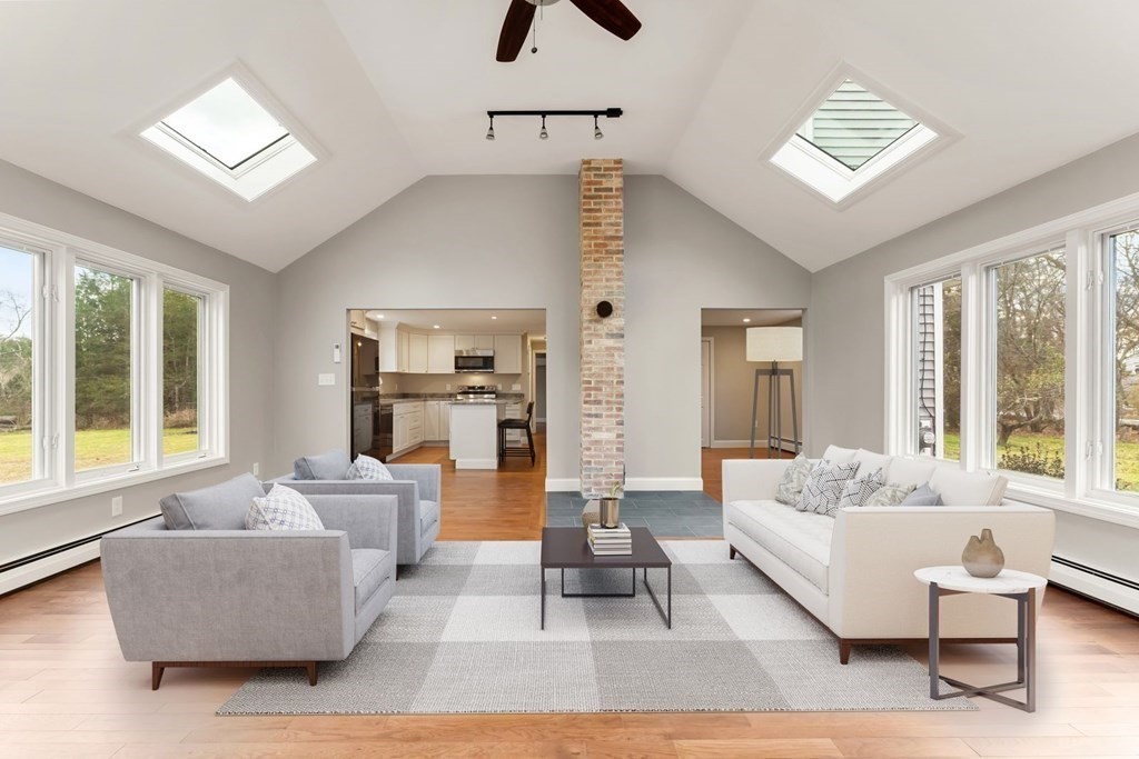 1069 Main Street Dunstable, MA 01827 - Photo 4 of 41 a living room with furniture and a large window