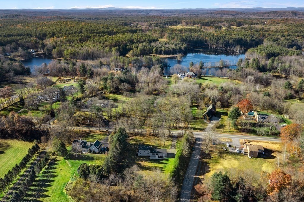 1069 Main Street Dunstable, MA 01827 - Photo 41 of 41 an aerial view of residential houses with outdoor space
