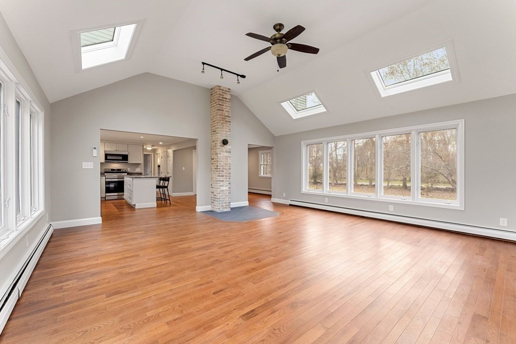 1069 Main Street Dunstable, MA 01827 - Photo 7 of 41 a view of empty room with wooden floor and fan
