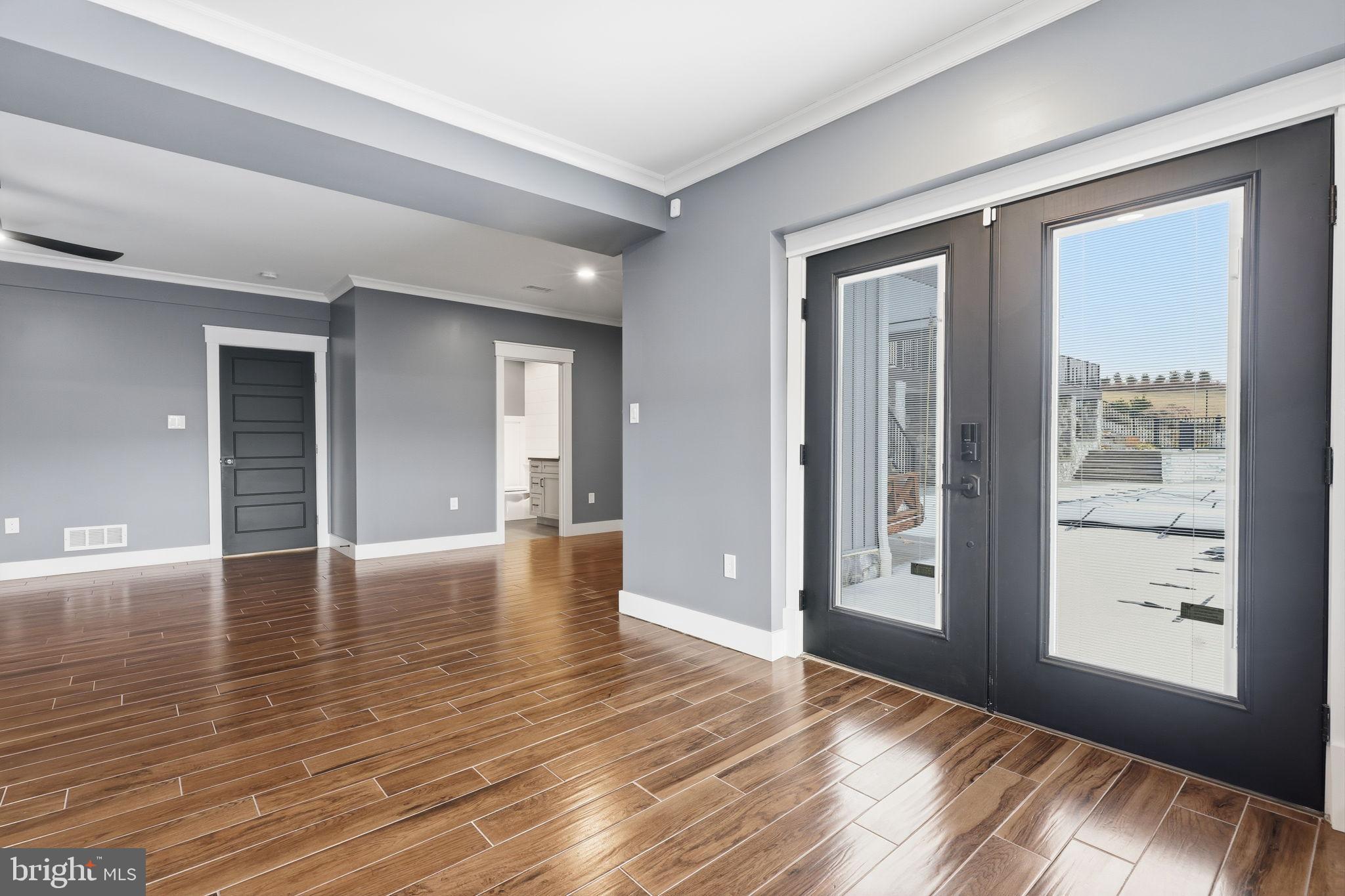 176 Fenstermaker Road Kutztown, PA 19530 - Photo 105 of 149 a view of an empty room with window and wooden floor