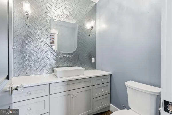 a white bath tub sitting next to a window