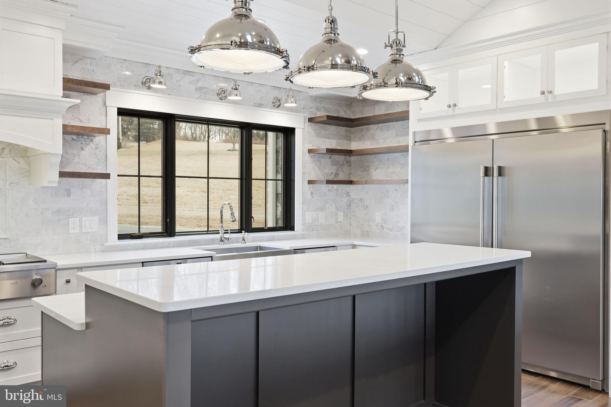 176 Fenstermaker Road Kutztown, PA 19530 - Photo 118 of 149 Sleek modern kitchen with elegant finishes.