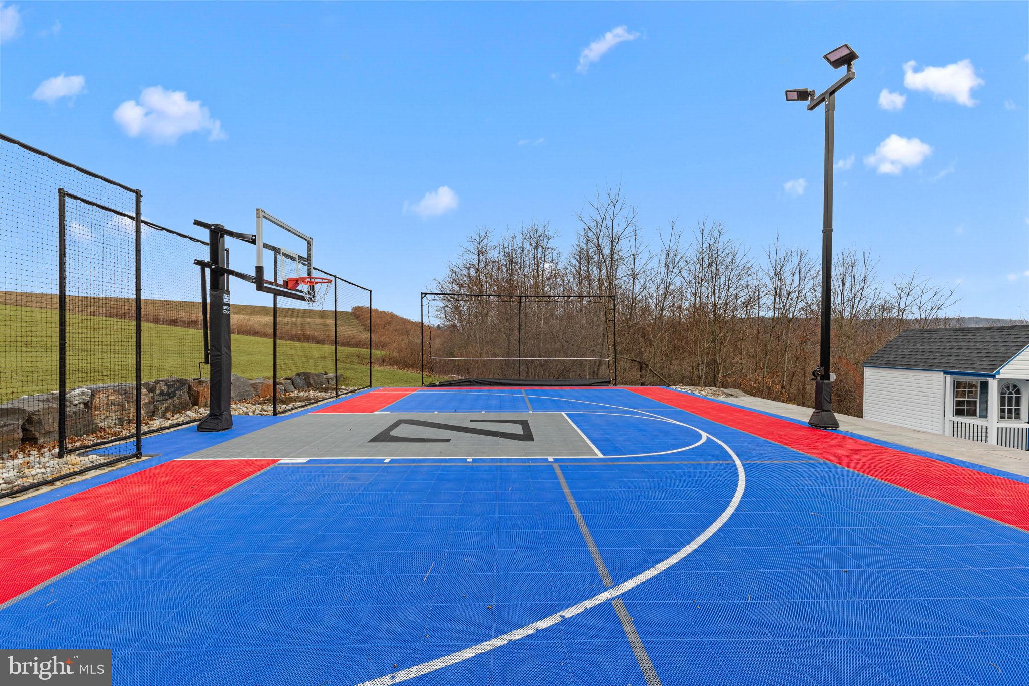 176 Fenstermaker Road Kutztown, PA 19530 - Photo 130 of 149 Vibrant outdoor basketball court retreat.