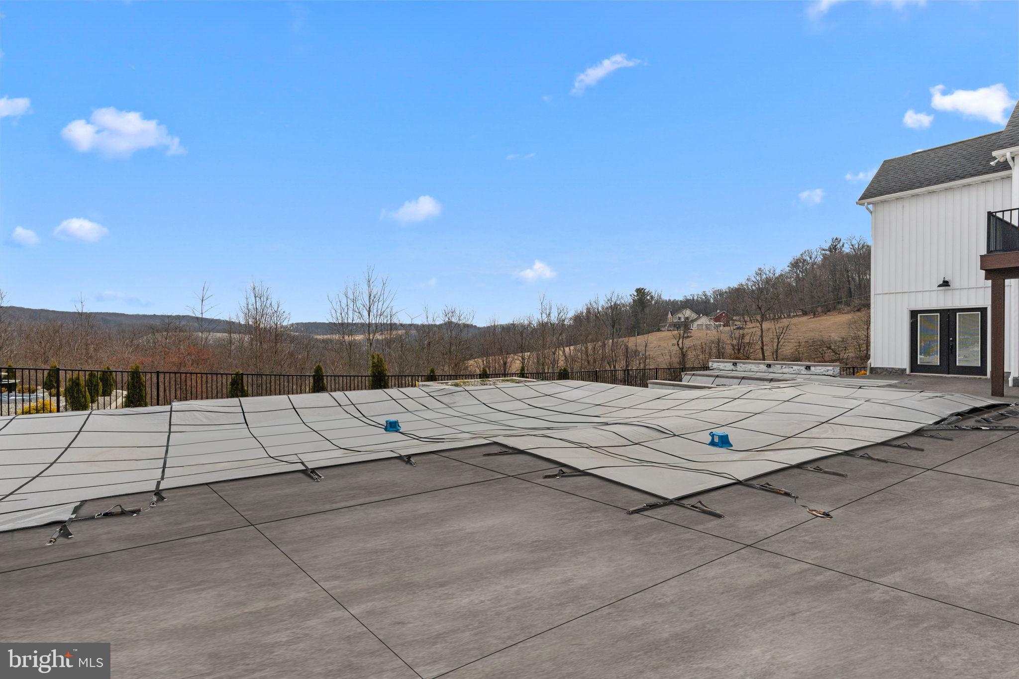 176 Fenstermaker Road Kutztown, PA 19530 - Photo 137 of 149 Expansive patio with scenic hillside views.