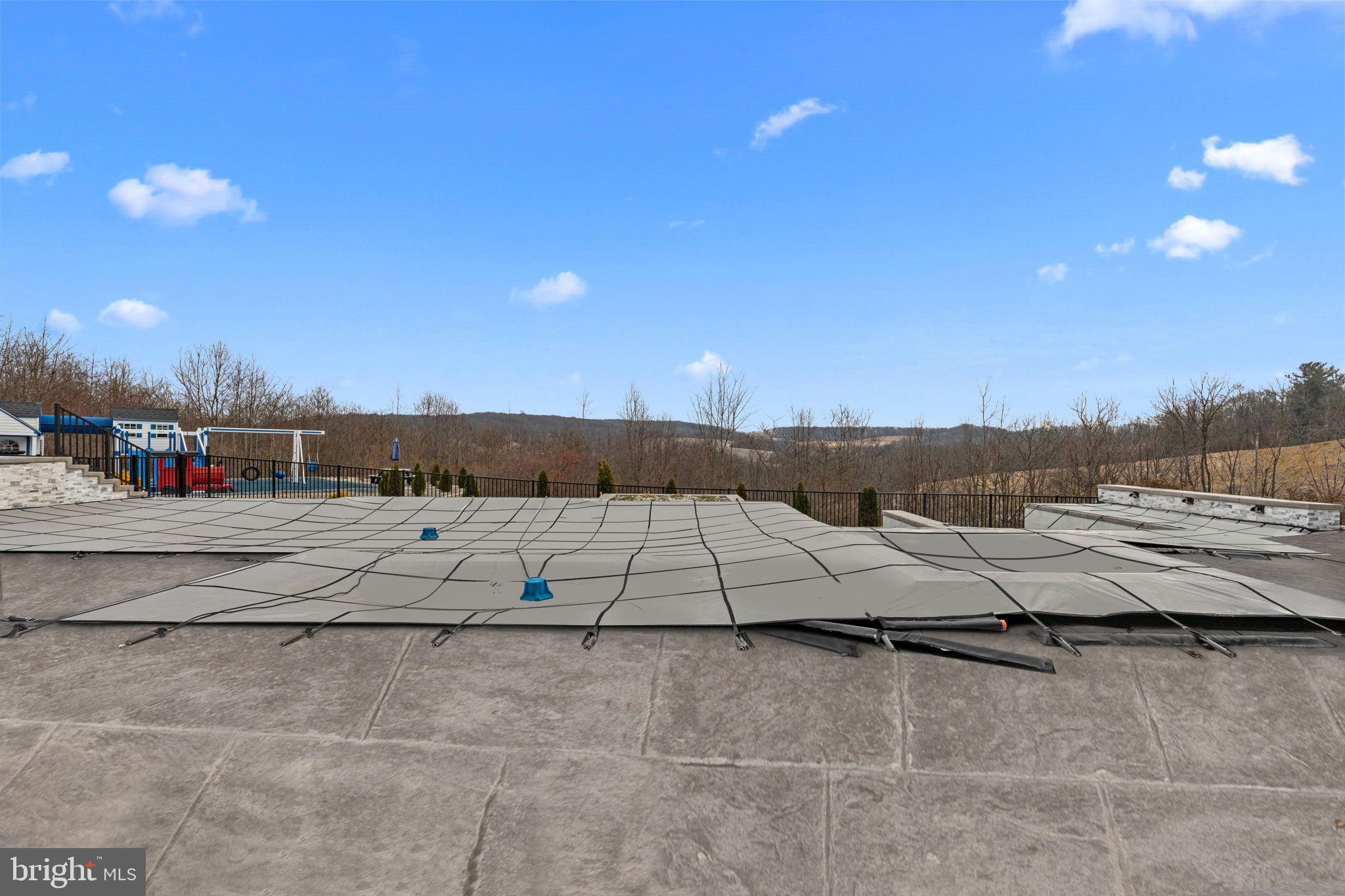 176 Fenstermaker Road Kutztown, PA 19530 - Photo 139 of 149 Serene landscape with a pool cover.