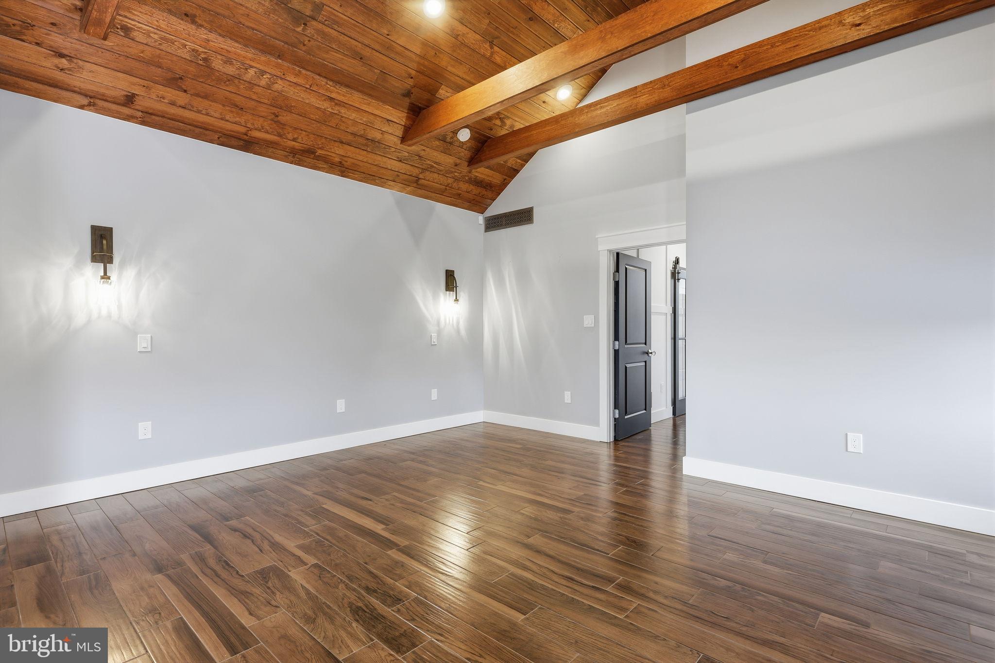 176 Fenstermaker Road Kutztown, PA 19530 - Photo 17 of 149 Spacious room with rustic wooden beams.